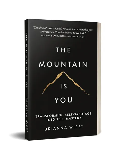 The Mountain Is You by Brianna Wiest paperback book on overcoming self-sabotage